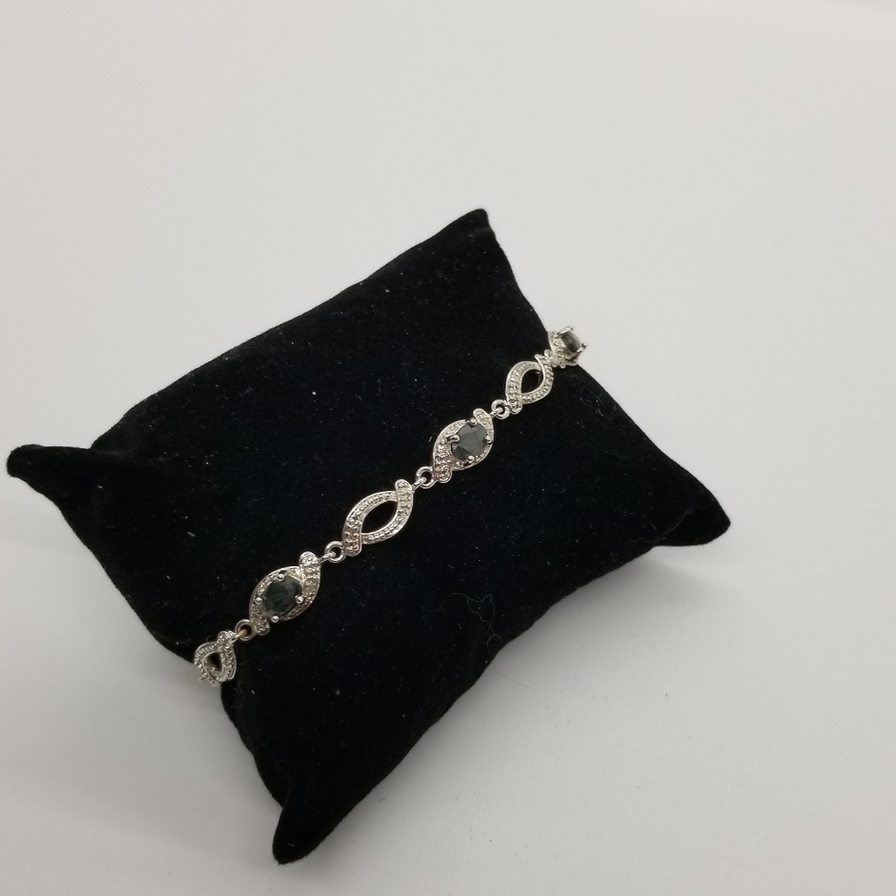 PAJ Prime Art & Jewel silver tone tennis bracelet with dark gray stones